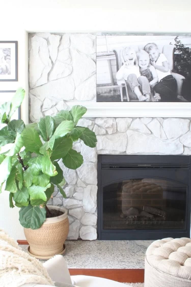 Painted Whitewashed Stacked Stone Fireplace