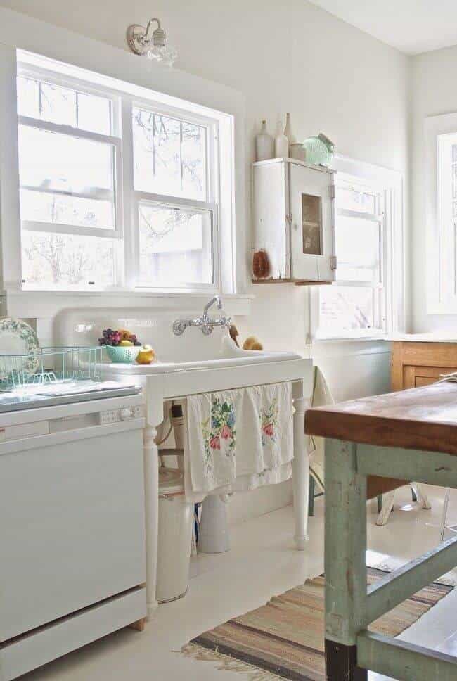 Antique Porcelain Sink and Distressed Wood Cupboard