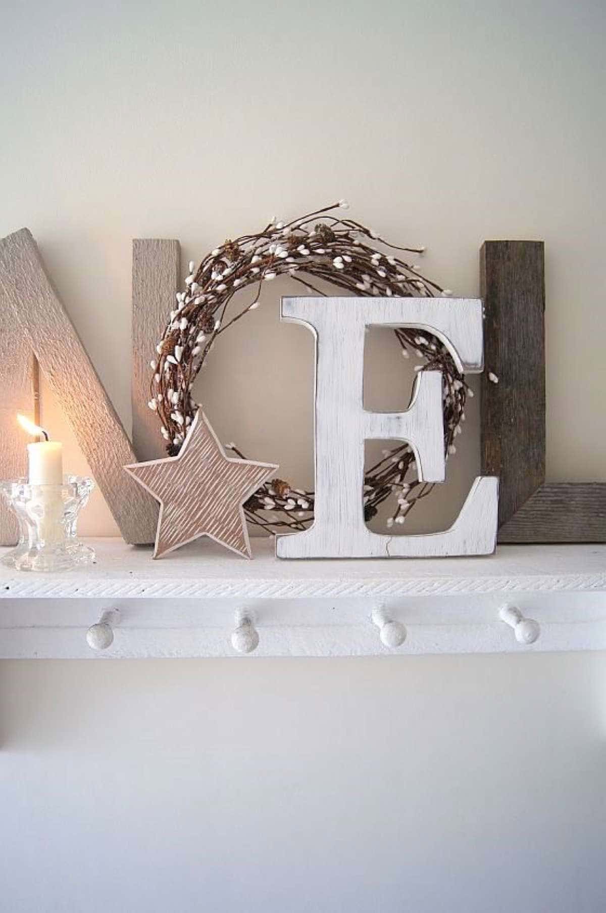 Wood “Noel” Sign With Grapevine Wreath