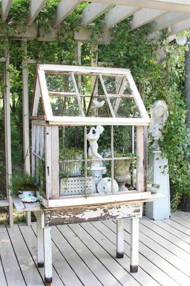 One Of The Repurposed Old Window Ideas Is A Terrarium