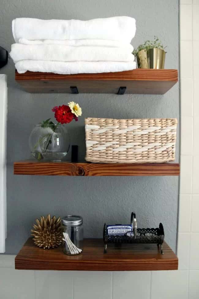 Small Bathroom Storage Ideas: Dark Stained “Floating” Wooden Shelves