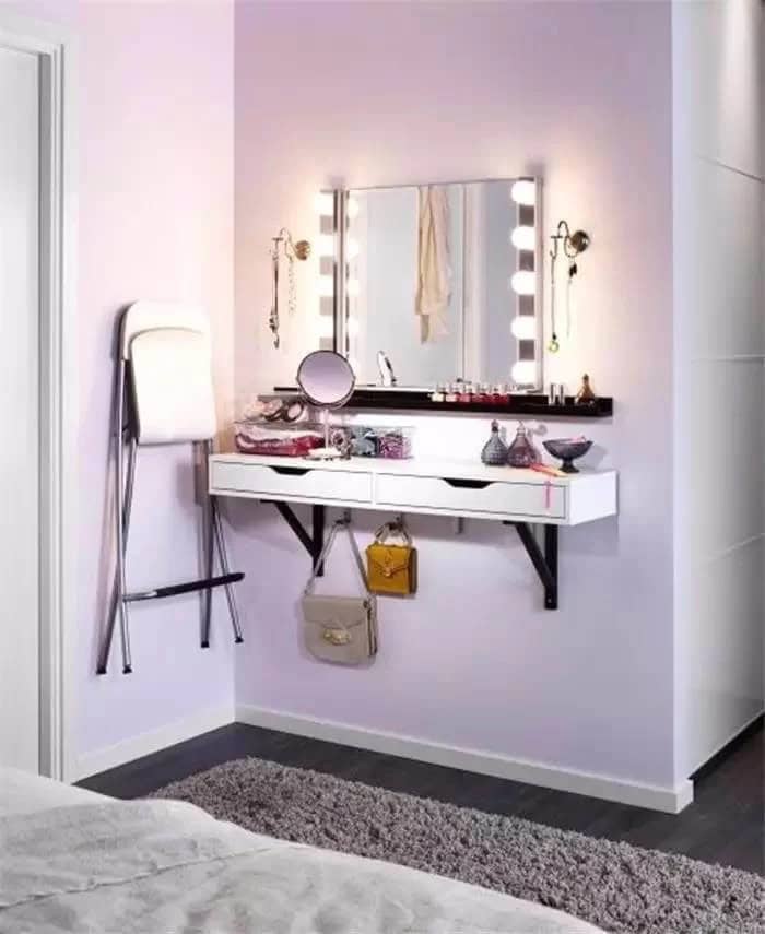 A Vanity with Hooks, Drawers, and Lighting