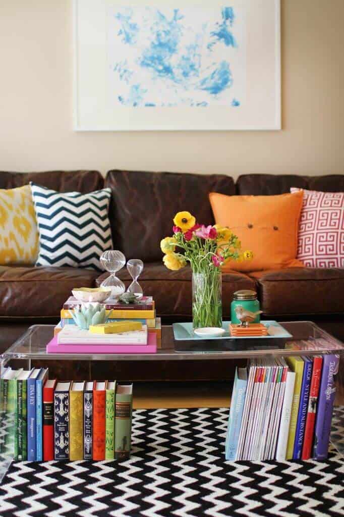 Book-lover’s Dream Acrylic Table with Storage Space and a Poppy Bouquet