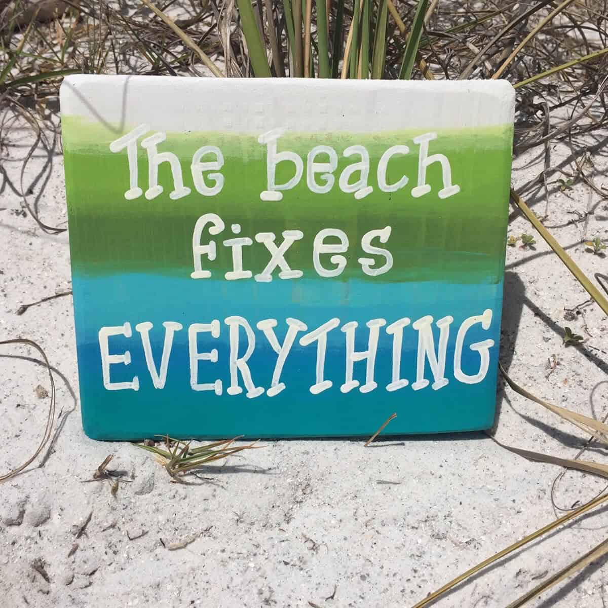 Green, Blue, and White Beach Sign