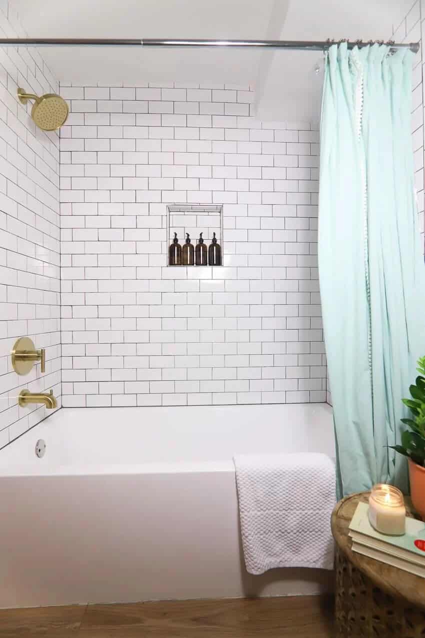 Subway Tile, Gold Fixtures, and Wood Floors