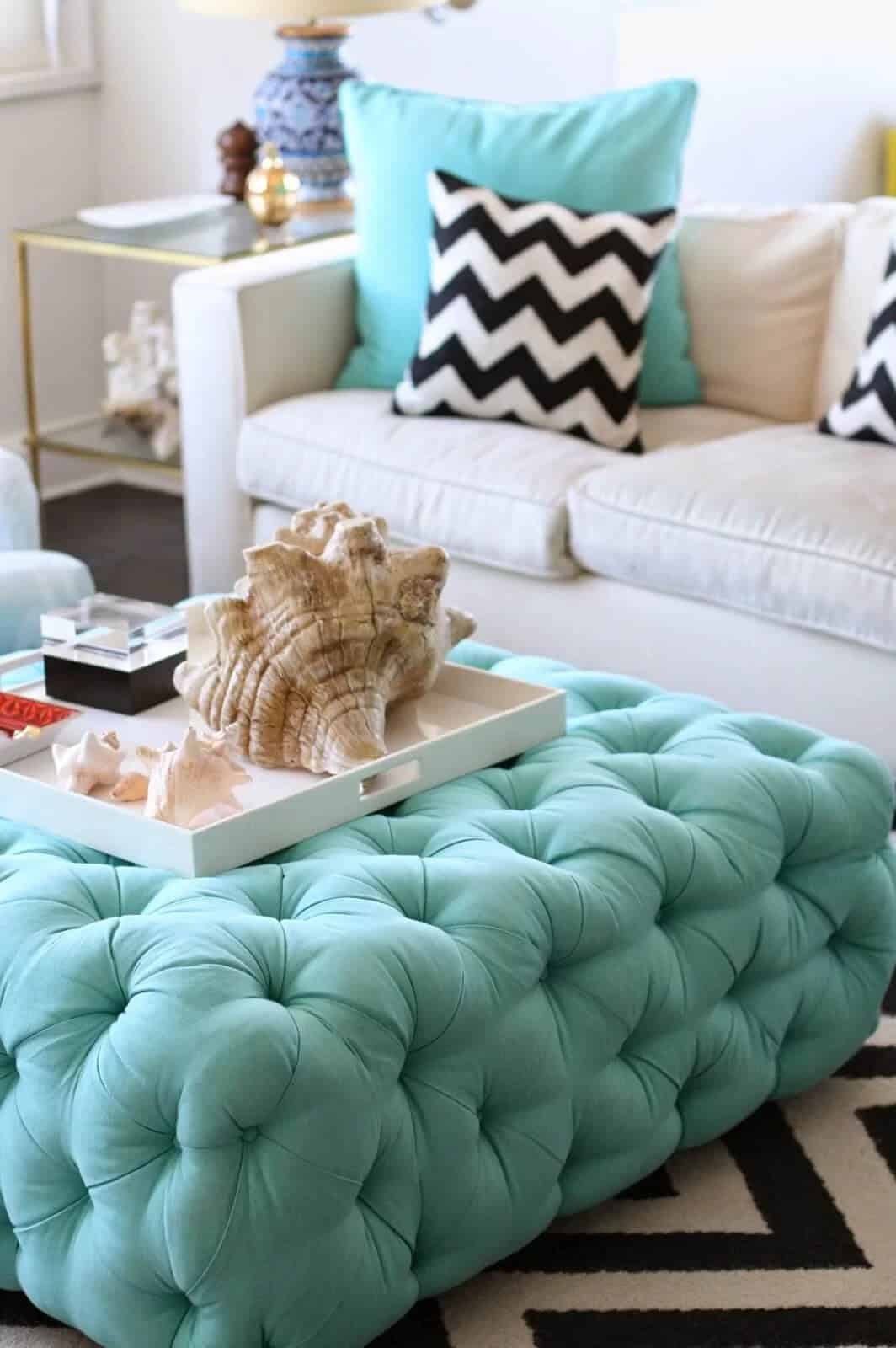 Turquoise Ottoman in a Shell-Inspired Living Area