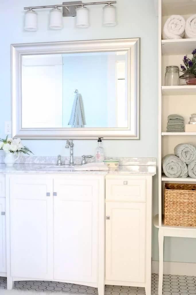 Marble Countertop and Wide Silver Mirror