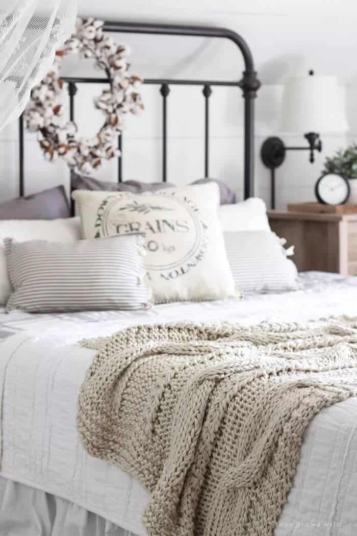 Gable-Style Iron and Linen Bedroom Decor