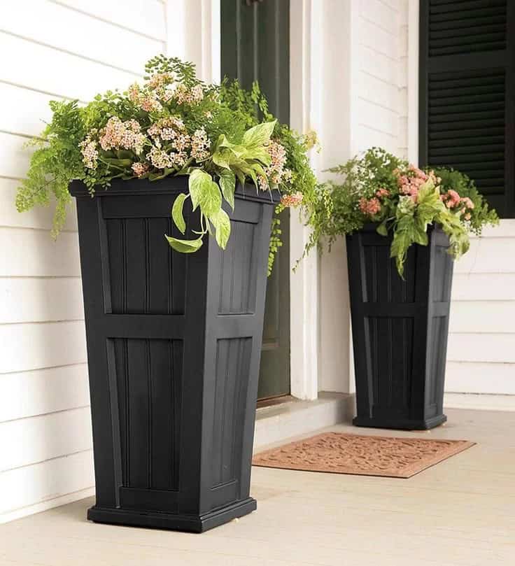 Vibrant Florals Set Against Dark Wood Planters Creates Wonderful Texture