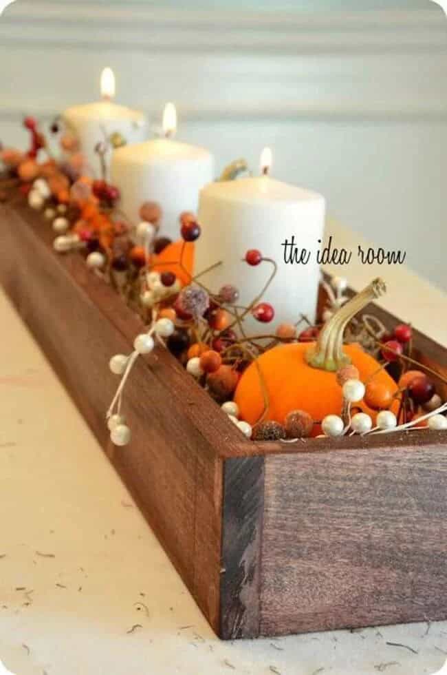 Fall-Inspired Centerpiece with Bright Orange Pumpkins