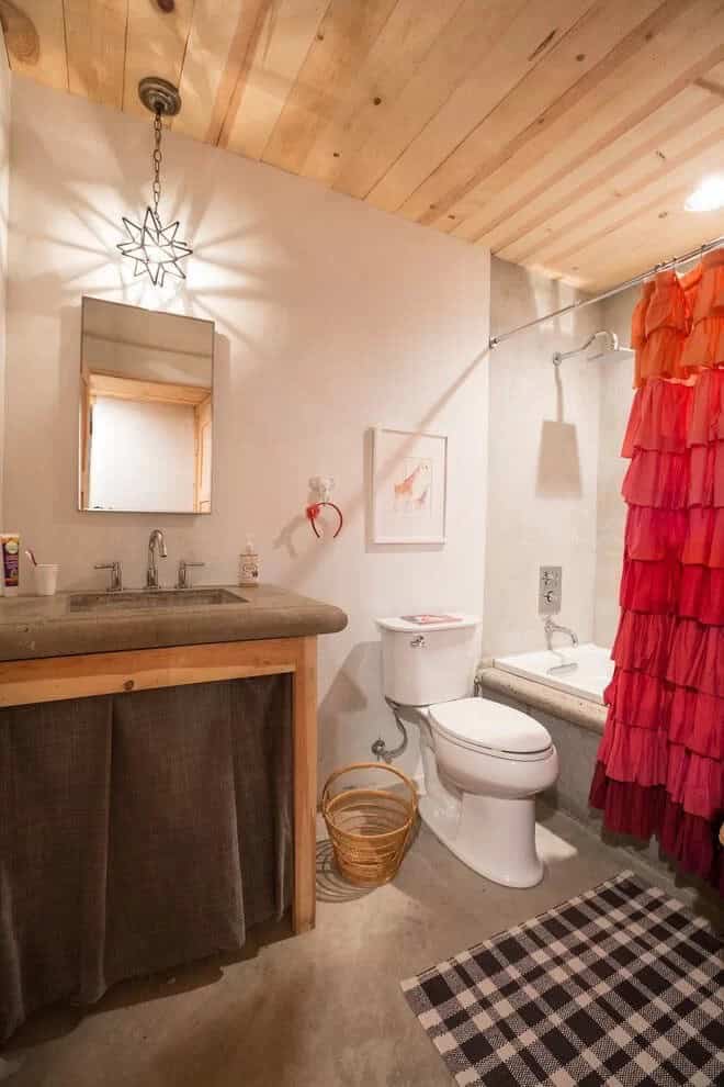 Lovely Eclectic Linens Add Textural Interest for a Small Bathroom