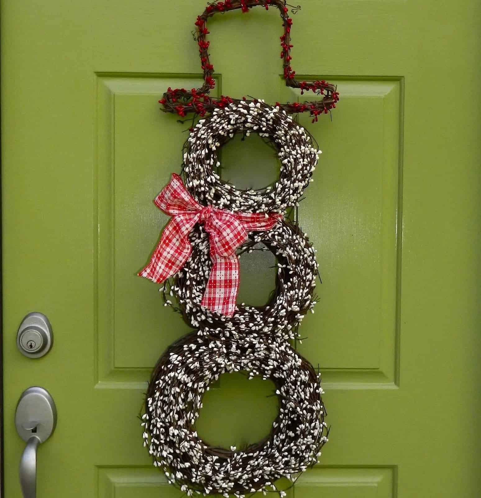 A Mini Holiday Snowman Made Of Wreaths