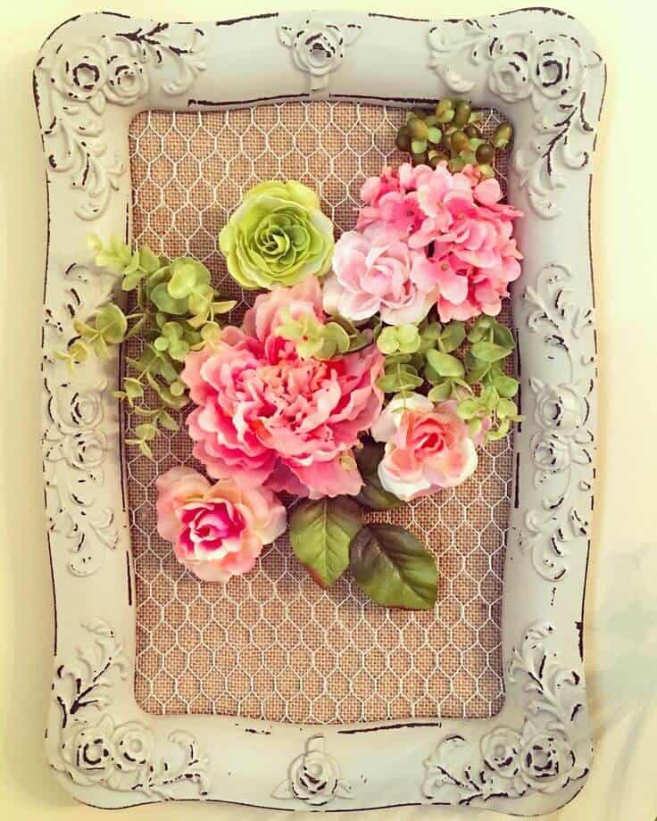 Upcycled Mirror Frame Holding Flowers