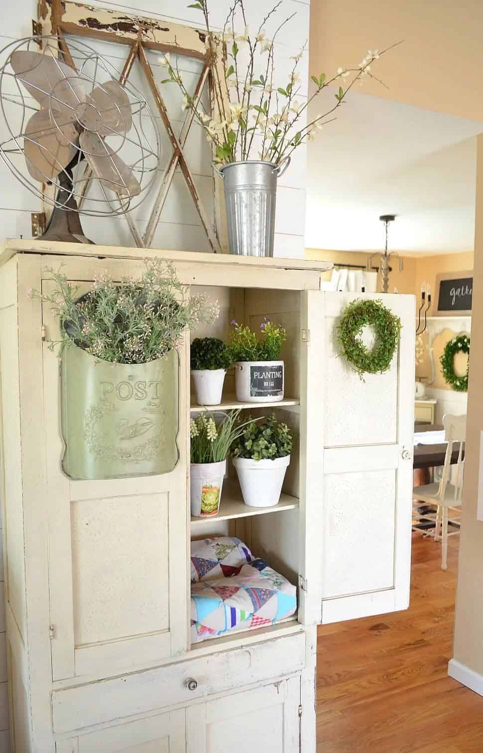 White Planter Arrangements and Moss Wreath