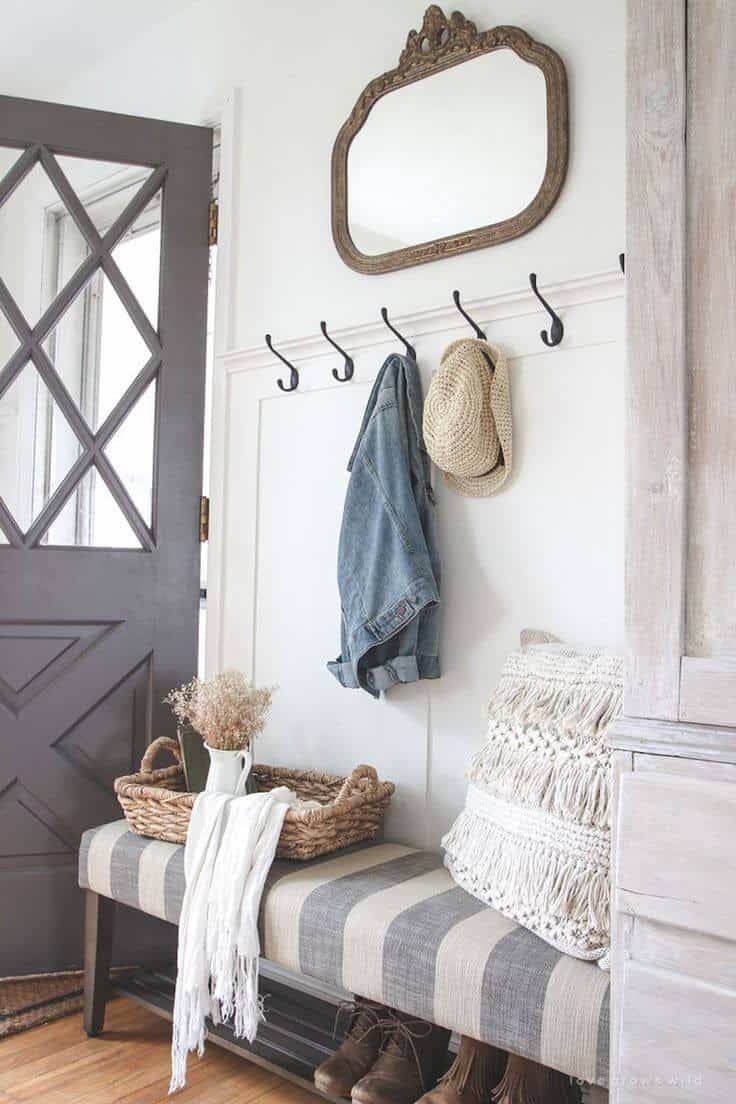 Wall Hooks on White and Gray-Striped Bench