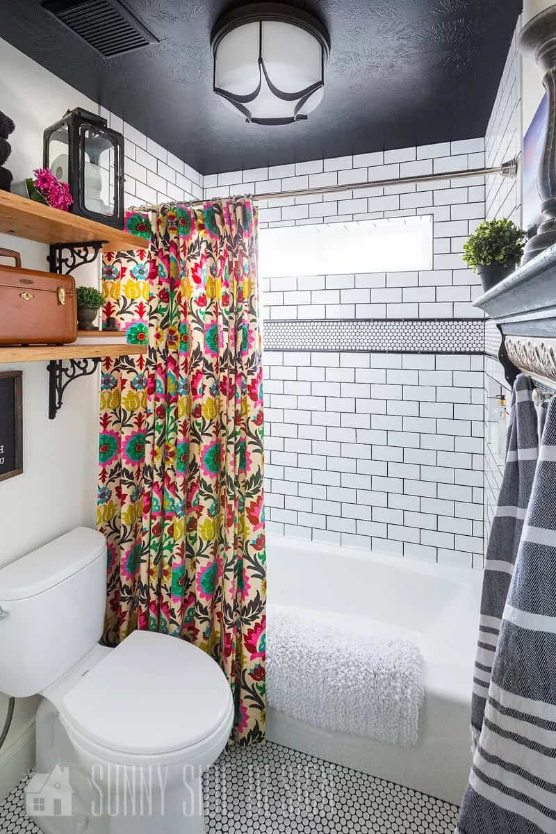 Bold Black Ceiling and Pop of Color Shower Curtain Modern Bathroom